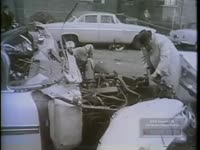 POLICE INVESTIGATE AT SCENE OF CAR BOMBING