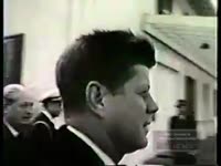 Series of WSB-TV newsfilm clips of President John F. Kennedy and British Prime Minister Harold MacMillan taking a trip on Kennedy's yacht, the "Honey Fitz," 1961 April 6