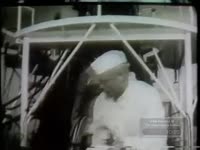 GLENN PREPARES FOR ROCKET LAUNCH (1962)