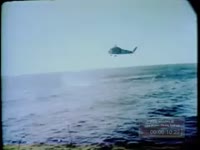 CAPSULE IS RECOVERED BY THE NAVY
