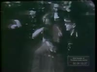 BRITAINS RUNNING OVER POLICE TO GET TO SPEAKERS (NO DATE)