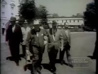 Series of WSB-TV newsfilm clips of Sir Winston Churchill and President Dwight D.Eisenhower leaving the White House to visit Eisenhower's farm, 1959 May 6