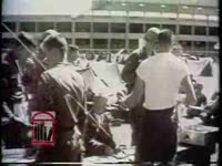 WSB-TV newsfilm clip of students and federal troops at the University of Mississippi campus after a riot protesting integration in Oxford, Mississippi, 1962 October
