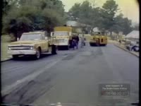 Film of Potholes in the Road Being Repaired