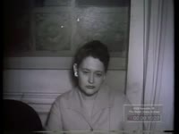Series of WSB-TV newsfilm clips of aftermath of custody hearing for Dorothy Ann Broyles, followed by interview with her biological parents, Cleveland, Ohio, 1960 September 20