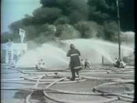 KANSAS CITY OIL EXPLOSION; FIREMEN BATTLE LARGE FIRE (1957)