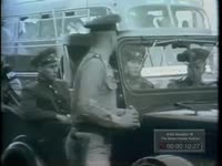 U.S.S.R. MILITARY MOTOR CONVOY PASSES THROUGH U.S. CHECKPOINT IN BERLIN (1961)
