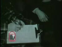 WSB-TV newsfilm clip of white students at the University of Georgia signing petitions requesting that the state legislature keep the school open after court-ordered integration in Athens, Georgia, 1961 January 8