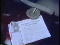 Series of WSB-TV newsfilm clips of a paid newspaper advertisement urging community support for the Orleans Parish School Board and white demonstrators protesting court-ordered desegregation at McDonogh 19 and William Frantz elementary schools in New Orleans, Louisiana, 1960 November and December