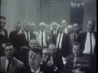 MEN ATTEND A CLINIC ON BURGLARY TECHNIQUES (NO LENGTH GIVEN)