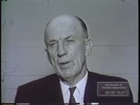 MAN DISCUSSES COLLAPSE OF BUILDING DURING FIRE; INJURED PERSONS SENT TO HAMILTON HOSPITAL (1964)