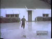 Series of WSB-TV newsfilm clips of a heavily flooded area and the resulting damage (No date)