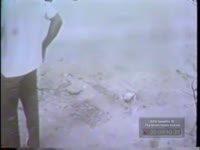FILM OF THE AREA WHERE A BUS PREVIOUSLY WRECKED (NO WRECKAGE IN FILM)