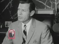 WSB-TV newsfilm clip of Georgia governor Carl Sanders speaking about public safety and voter registration in Americus from his office in Atlanta, Georgia, 1965 August 4