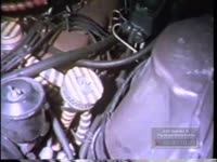 MAN DISCUSSES EXHAUST CONTROL SYSTEM ON CAR