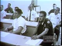 INSPECTION STATION EMPLOYEES AT TRAINING SCHOOL CONDUCTED BY THE STATE PATROL