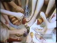 YOUNG WOMEN HAVE BRIGHTLY COLORED FEET AND SHOES