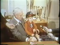 Ivan Allen talks with March of Dimes poster child.
