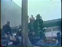 ATLANTA FIREMEN AT SCENE OF FIRE IN LARGE DOWNTOWN BUILDING