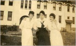 Three Students in front of Ashley Hall