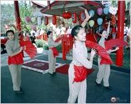 Employees of China Garden perform a ceremonial dance for luck while celebrating the Chinese New Year