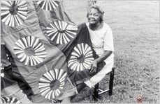 Quilter Fannie Lee Teals of Tifton shows her "Wheel of Fortune" and "Bicentennial" quilts