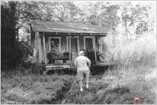 Pat Wetherington Brockinton walking toward the old commissary at Dayton Turpentine Camp outside Fargo