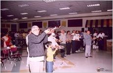 Men singing devotional praise songs