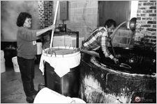 Maria Ruiz and Jose Ruiz empty the kettle
