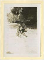 Photograph of man with a bob cat, Ludowici, Georgia