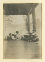 Photograph of a group of men with a dog, Ludowici, Georgia