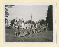 Photograph of children with a Christmas sleigh decoration, Ludowici, Georgia