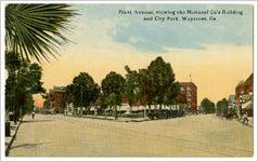Plant Avenue, viewing the National Co's Building and City Park, Waycross, Ga. (postmarked December 27, 1915)