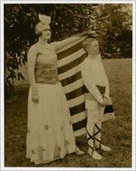 Photograph of Mrs. John Allen Representing America with Page, Frank Miller Neil, Son of Mr. and Mrs. H. C. Neil, at Peach Festival, Fort Valley, Peach County, Georgia, 1924