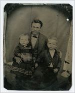 Photograph of an unidentified man and two children, Grady County, Georgia