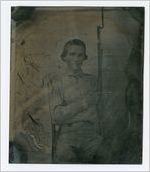 Photograph of an unidentified man holding a bayonet, Grady County, Georgia