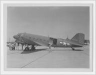 Photograph of men with an airplane at Bainbridge Army Airfield, Bainbridge, Georiga, c. 1944